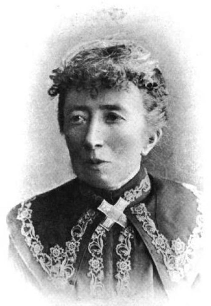 A black and white portrait photograph of Agnes Clerke.